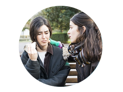 Photo of two young women talking